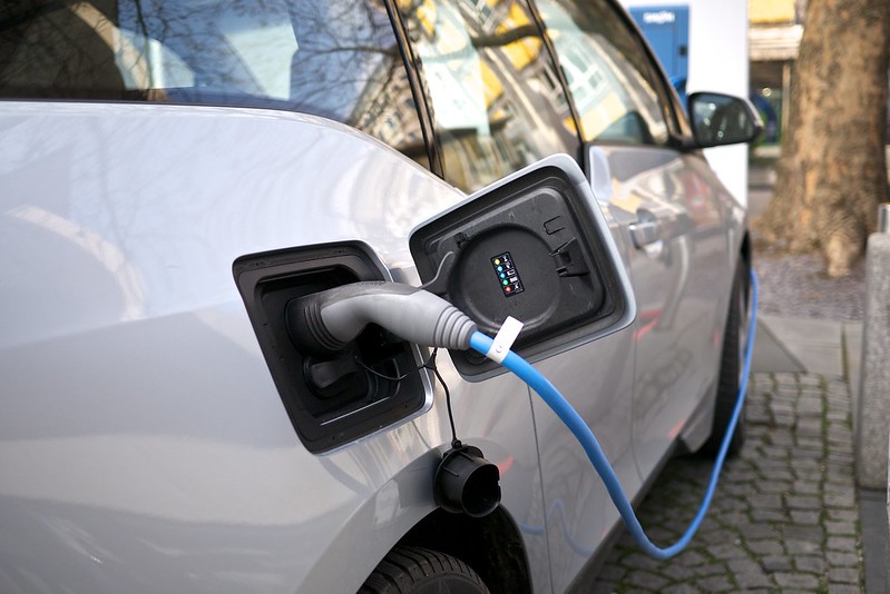 an electric car plugged into a charger