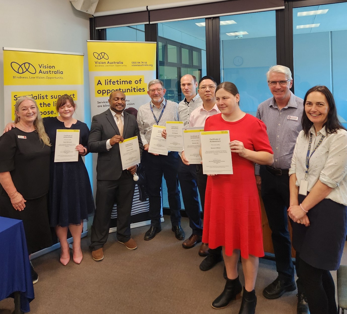 "The Career Visions graduates along with Tracee Cooke from TAFE Queensland, Joe Kelly MP and Harmonie Downes, the Program Coordinator"