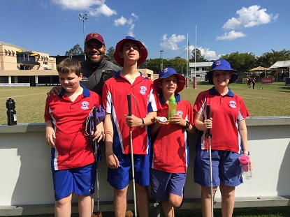 Image shows VA clients with Broncos' star Sam Thaiday